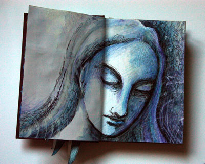 Altered book with woman's face