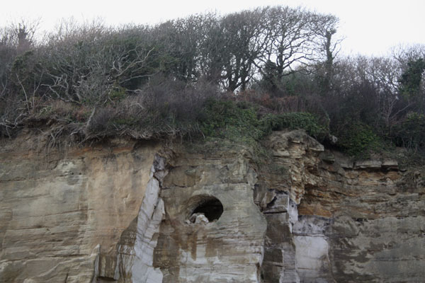 Cave in cliff - Pett Level beach