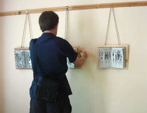 Kevin Putting up Altered Books