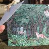 The back of The Wood at Dusk papercut concertina card.